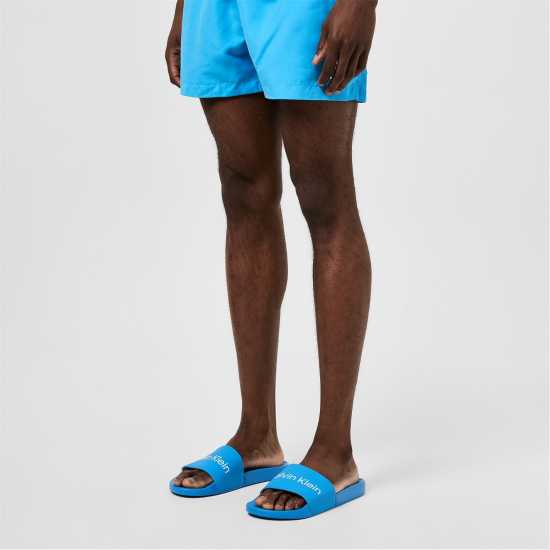 Мъжки сандали и джапанки Calvin Klein Logo Sliders Синьо Смущение/Бяло Calvin Klein Logo Sliders Синьо Смущение/Бяло Мъжки сандали и джапанки