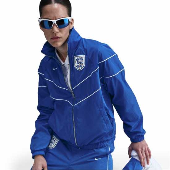 Футболни екипи за бягане Nike Тъкано Горнище England Woven Jacket 2025 Womens Nike Тъкано Горнище England Woven Jacket 2025 Womens Футболни екипи за бягане