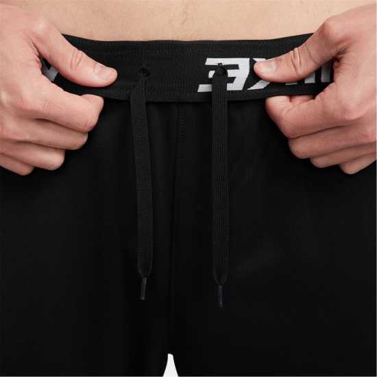 Nike Totality Men's Dri-FIT Tapered Versatile Pants Black/White Мъжки меки спортни долнища
