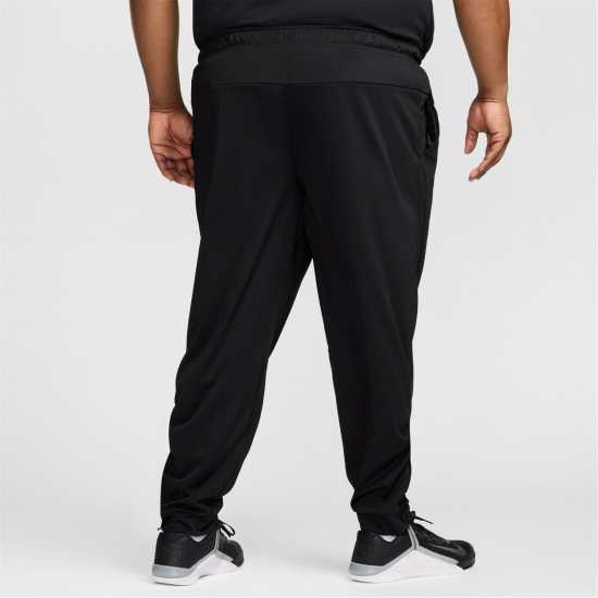 Nike Totality Men's Dri-FIT Tapered Versatile Pants Black/White Мъжки меки спортни долнища