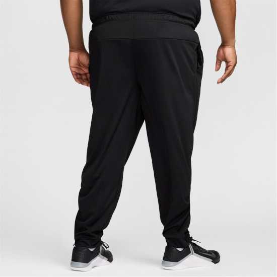 Nike Totality Men's Dri-FIT Tapered Versatile Pants  