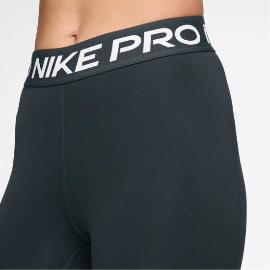 Дамски дрехи за фитнес Nike Pro Women's Mid-Rise Mesh-Panelled Leggings SEAWEED/WHITE Nike Pro Women's Mid-Rise Mesh-Panelled Leggings SEAWEED/WHITE Дамски дрехи за фитнес
