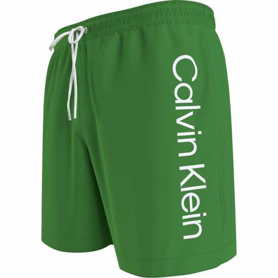Мъжки плувни шорти и клинове Calvin Klein Large Logo Swim Shorts Зелено 2025 Calvin Klein Large Logo Swim Shorts Зелено 2025 Мъжки плувни шорти и клинове