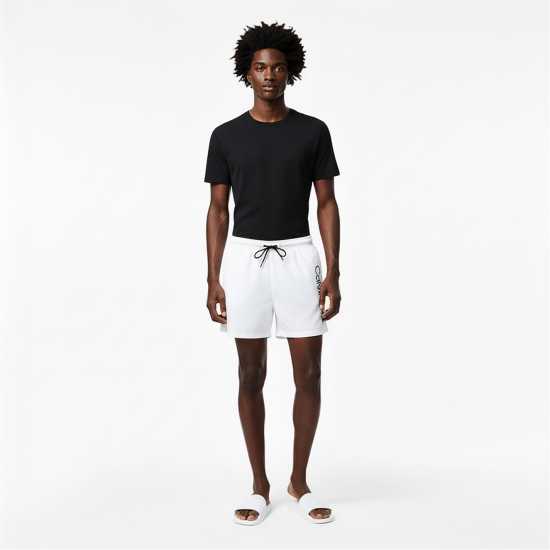 Calvin Klein Large Logo Swim Shorts White 26 Calvin Klein Large Logo Swim Shorts