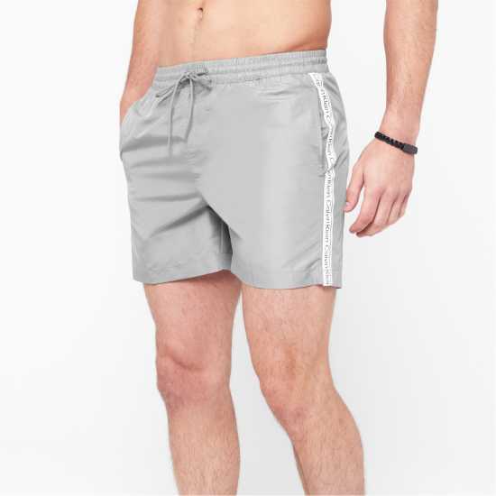 Calvin Klein Мъжки Плувни Шорти Medium Tape Swim Shorts Mens Grey Мъжки къси панталони