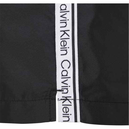 Calvin Klein Мъжки Плувни Шорти Medium Tape Swim Shorts Mens PVH Black Мъжки къси панталони