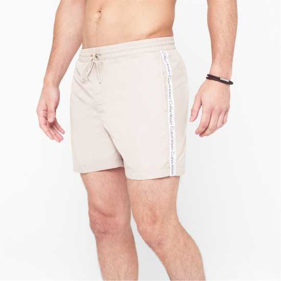 Calvin Klein Мъжки Плувни Шорти Medium Tape Swim Shorts Mens Beige Мъжки къси панталони