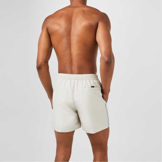 Calvin Klein Мъжки Плувни Шорти Medium Tape Swim Shorts Mens Stony Beige ACE Мъжки къси панталони