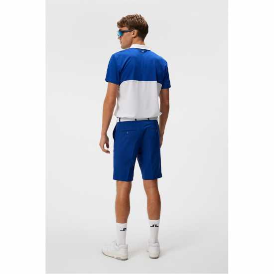 Дрехи за голф J Lindeberg Golf Kohen Polo Sn99 Содалитово синьо J Lindeberg Golf Kohen Polo Sn99 Содалитово синьо Дрехи за голф