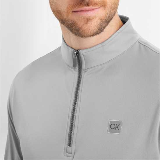 Дрехи за голф Calvin Klein Golf G 1/4Zp Sn99 Silver Calvin Klein Golf G 1/4Zp Sn99 Silver Дрехи за голф