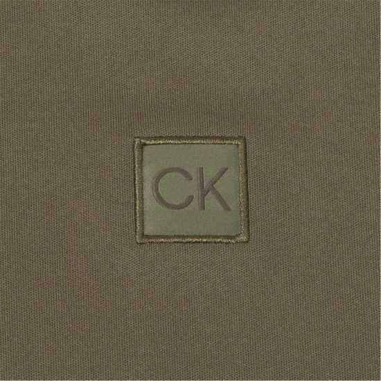 Дрехи за голф Calvin Klein Golf G 1/4Zp Sn99 Olive Calvin Klein Golf G 1/4Zp Sn99 Olive Дрехи за голф