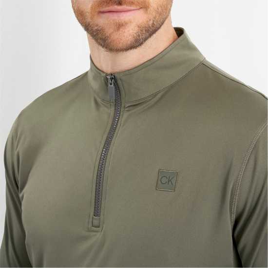 Дрехи за голф Calvin Klein Golf G 1/4Zp Sn99 Olive Calvin Klein Golf G 1/4Zp Sn99 Olive Дрехи за голф