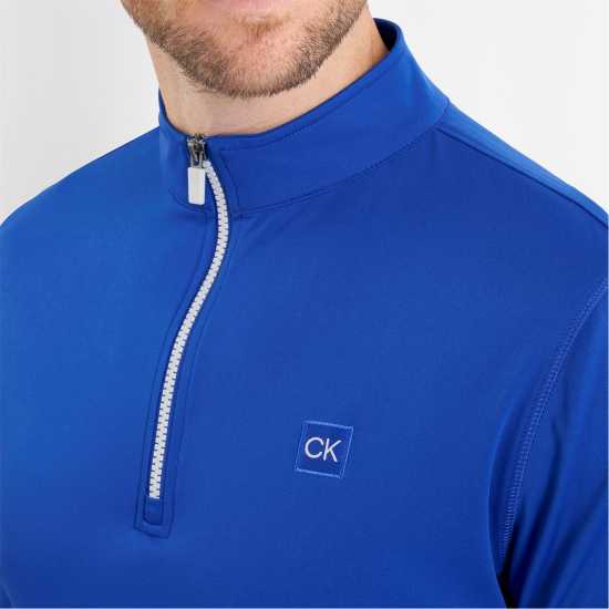 Дрехи за голф Calvin Klein Golf G 1/4Zp Sn99 Cobalt Calvin Klein Golf G 1/4Zp Sn99 Cobalt Дрехи за голф