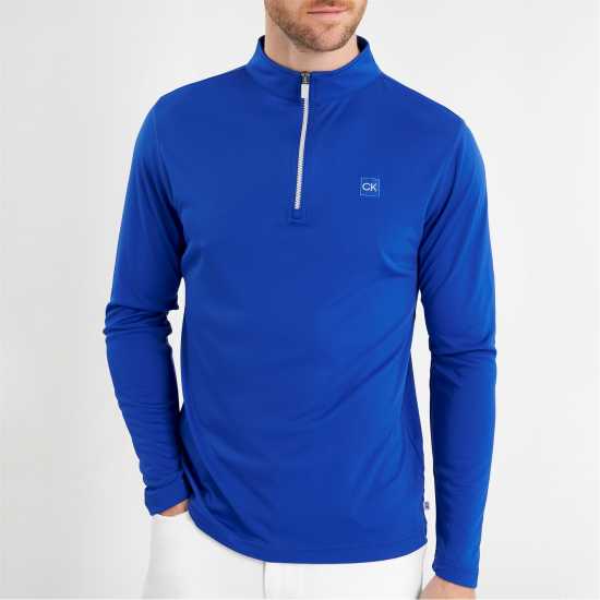 Дрехи за голф Calvin Klein Golf G 1/4Zp Sn99 Cobalt Calvin Klein Golf G 1/4Zp Sn99 Cobalt Дрехи за голф