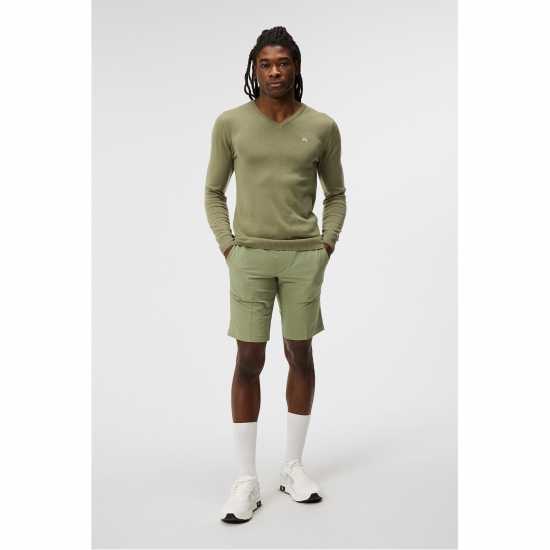 Дрехи за голф J Lindeberg Golf Lym Kn Swtr Sn99 Маслено зелено J Lindeberg Golf Lym Kn Swtr Sn99 Маслено зелено Дрехи за голф