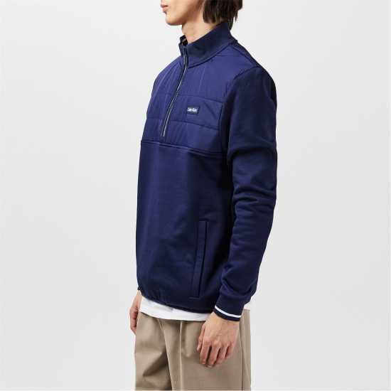 Дрехи за голф Calvin Klein Golf Baylor Creek Hybrid Half Zip Pullover Calvin Klein Golf Baylor Creek Hybrid Half Zip Pullover Дрехи за голф