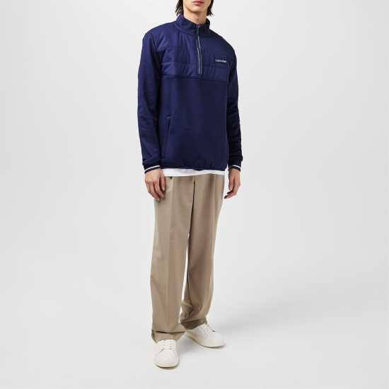 Дрехи за голф Calvin Klein Golf Baylor Creek Hybrid Half Zip Pullover Calvin Klein Golf Baylor Creek Hybrid Half Zip Pullover Дрехи за голф