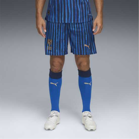 Футболни тренировъчни долнища Puma X Kidssuper Al Hilal Home Shorts 2025 2026 Adults Puma X Kidssuper Al Hilal Home Shorts 2025 2026 Adults Футболни тренировъчни долнища