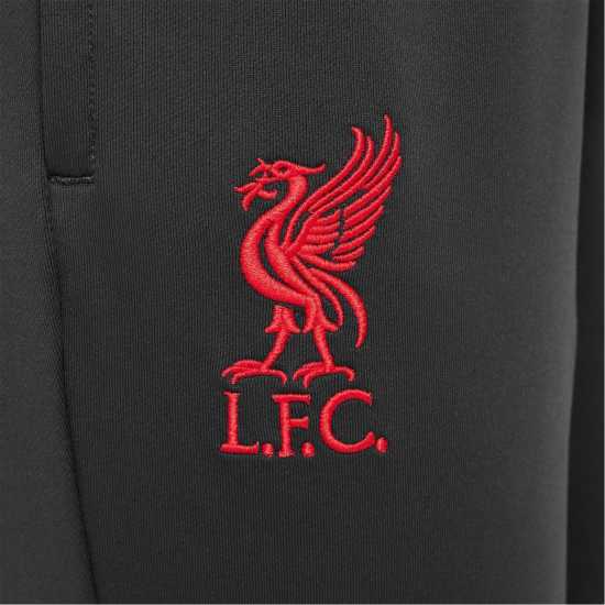 Детски долнища за бягане Nike Liverpool Strike Third Tracksuit Bottoms 2024 2025 Juniors Nike Liverpool Strike Third Tracksuit Bottoms 2024 2025 Juniors Детски долнища за бягане