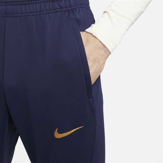 Мъжки спортни екипи в две части Nike Paris Saint-Germain Strike Dri-Fit Tracksuit Bottom Adults Nike Paris Saint-Germain Strike Dri-Fit Tracksuit Bottom Adults Мъжки спортни екипи в две части