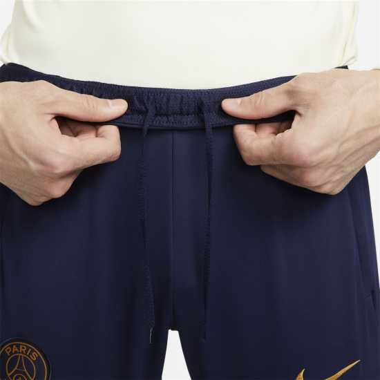 Мъжки спортни екипи в две части Nike Paris Saint-Germain Strike Dri-Fit Tracksuit Bottom Adults Nike Paris Saint-Germain Strike Dri-Fit Tracksuit Bottom Adults Мъжки спортни екипи в две части