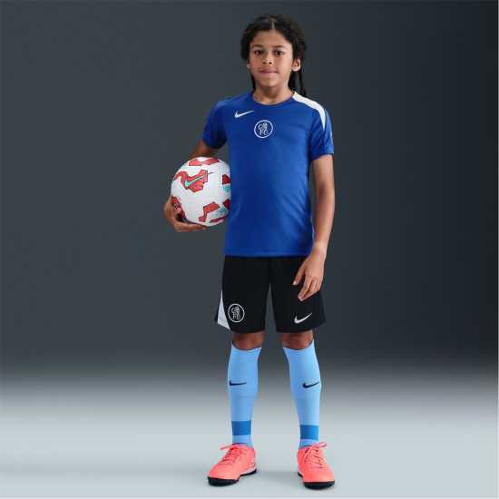 Футболни тренировъчни горнища Nike Chelsea Strike Top 2025 2026 Juniors Nike Chelsea Strike Top 2025 2026 Juniors Футболни тренировъчни горнища