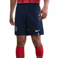 Футболни тренировъчни долнища Nike Paris Saint-Germain Home Shorts 2025 2026 Adults Nike Paris Saint-Germain Home Shorts 2025 2026 Adults Футболни тренировъчни долнища