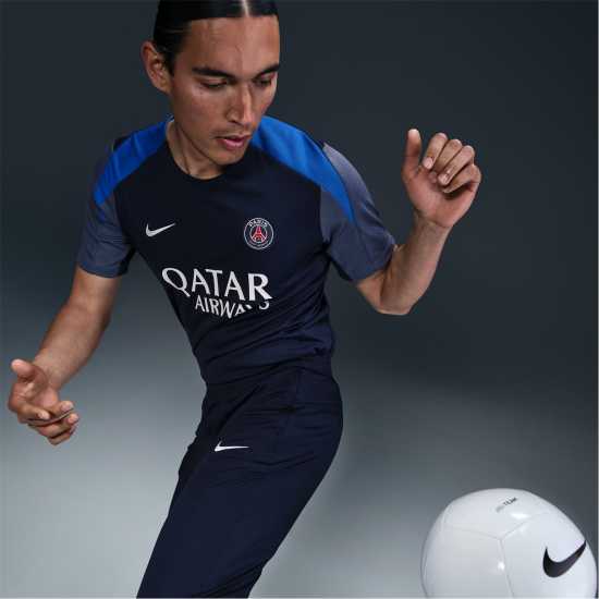 Всекидневно футболно облекло Nike Psg Strike T-Shirt 2025 2026 Adults Nike Psg Strike T-Shirt 2025 2026 Adults Всекидневно футболно облекло