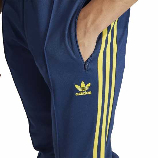 Мъжки спортни екипи в две части Adidas Arsenal Beckenbauer Tracksuit Bottoms Adults Adidas Arsenal Beckenbauer Tracksuit Bottoms Adults Мъжки спортни екипи в две части