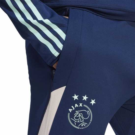 Мъжки спортни екипи в две части Adidas Ajax Amsterdam Tiro 23 Training Pants Adidas Ajax Amsterdam Tiro 23 Training Pants Мъжки спортни екипи в две части