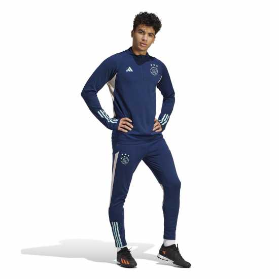 Мъжки спортни екипи в две части Adidas Ajax Amsterdam Tiro 23 Training Pants Adidas Ajax Amsterdam Tiro 23 Training Pants Мъжки спортни екипи в две части