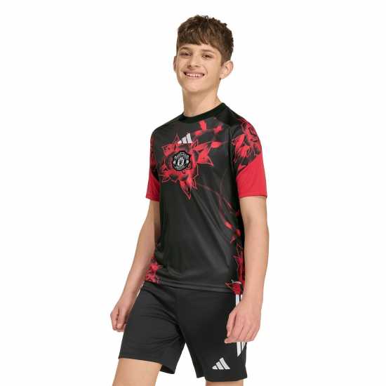 Adidas Manchester United Pre Match Shirt 2026/27 Juniors Adidas Manchester United Pre Match Shirt 2026/27 Juniors