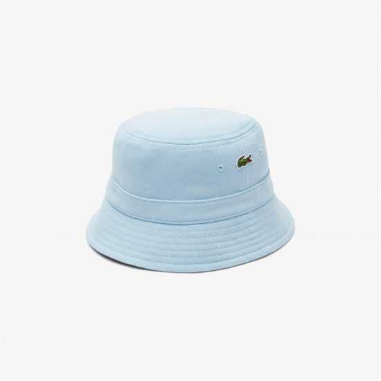 Шапки с козирка Lacoste Рибарска Шапка Bucket Hat Sn52 Светлосин Lacoste Рибарска Шапка Bucket Hat Sn52 Светлосин Шапки с козирка