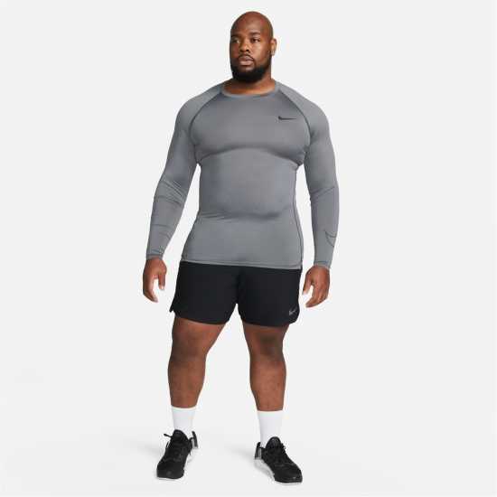Мъжки долни дрехи Nike Pro Dri-FIT Men's Tight Fit Long-Sleeve Top Nike Pro Dri-FIT Men's Tight Fit Long-Sleeve Top Мъжки долни дрехи