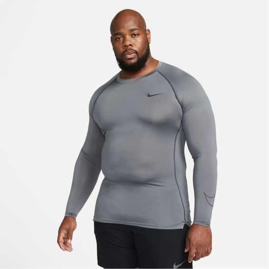Мъжки долни дрехи Nike Pro Dri-FIT Men's Tight Fit Long-Sleeve Top Nike Pro Dri-FIT Men's Tight Fit Long-Sleeve Top Мъжки долни дрехи
