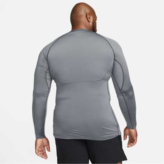 Мъжки долни дрехи Nike Pro Dri-FIT Men's Tight Fit Long-Sleeve Top Nike Pro Dri-FIT Men's Tight Fit Long-Sleeve Top Мъжки долни дрехи