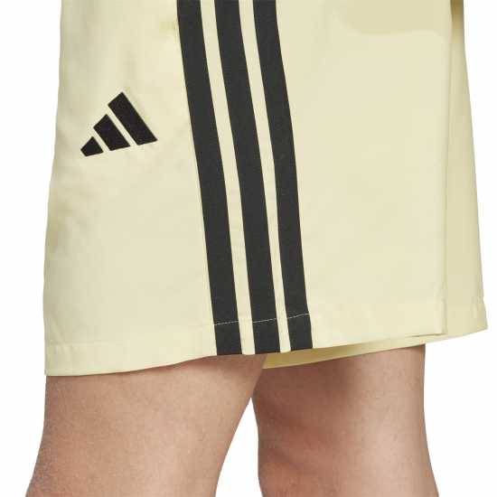 Adidas Essentials 3-Stripes Shorts Прахово жълто Дамски къси панталони