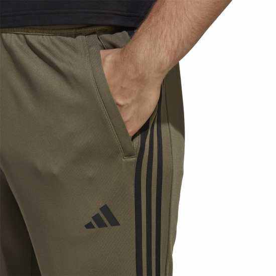 Мъжки спортни екипи в две части Adidas 3 Stripe Training Essentials Jogger Mens Олива Страта Adidas 3 Stripe Training Essentials Jogger Mens Олива Страта Мъжки спортни екипи в две части