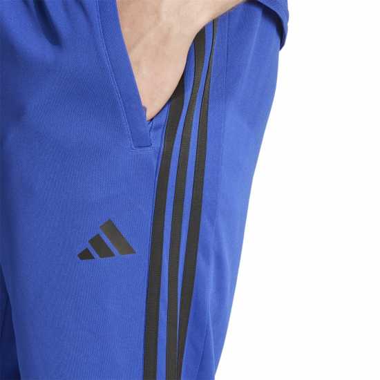 Мъжки спортни екипи в две части Adidas 3 Stripe Training Essentials Jogger Mens Полу прозрачен син Adidas 3 Stripe Training Essentials Jogger Mens Полу прозрачен син Мъжки спортни екипи в две части