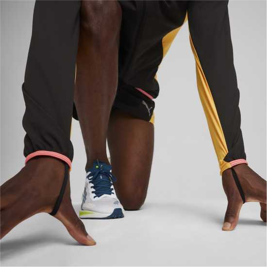 Puma Run Elite Ultraweave Jacket M Черно/Слънчево Мъжки якета и палта