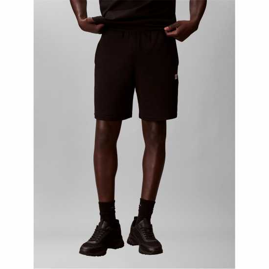 Calvin Klein Jeans Men's Woven Badge Fleece Jogger Shorts  