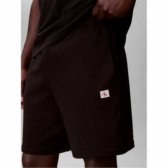 Calvin Klein Jeans Men's Woven Badge Fleece Jogger Shorts  