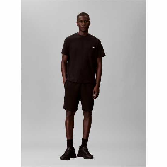 Calvin Klein Jeans Men's Woven Badge Fleece Jogger Shorts  