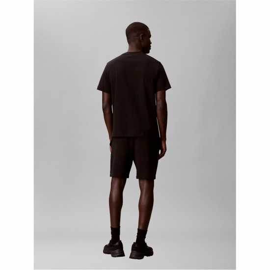 Calvin Klein Jeans Men's Woven Badge Fleece Jogger Shorts  