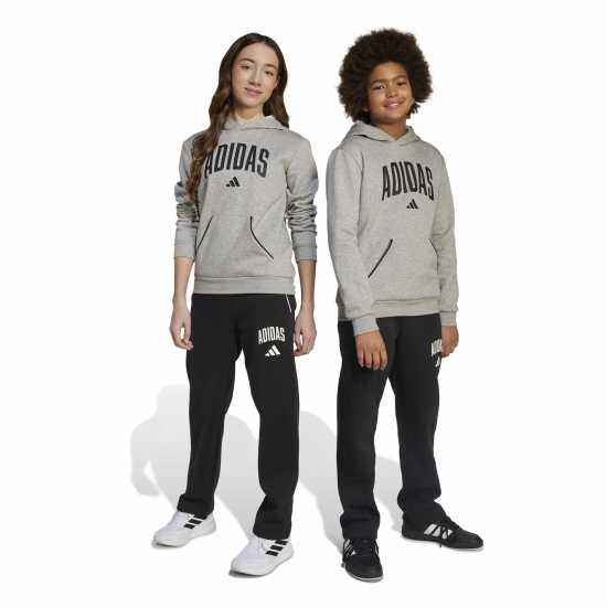 Детски долнища на анцуг Adidas Seasonals Essentials Collegiate Pant Juniors Black/White Adidas Seasonals Essentials Collegiate Pant Juniors Black/White Детски долнища на анцуг