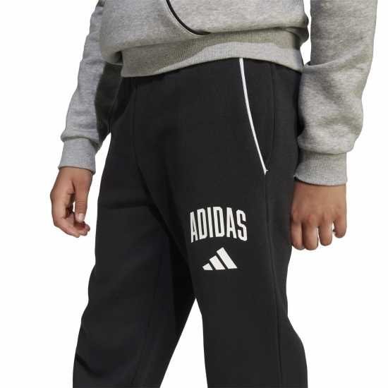 Детски долнища на анцуг Adidas Seasonals Essentials Collegiate Pant Juniors Black/White Adidas Seasonals Essentials Collegiate Pant Juniors Black/White Детски долнища на анцуг