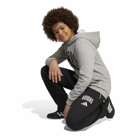 Детски долнища на анцуг Adidas Seasonals Essentials Collegiate Pant Juniors Black/White Adidas Seasonals Essentials Collegiate Pant Juniors Black/White Детски долнища на анцуг