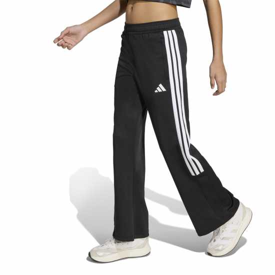 Детски долнища на анцуг Adidas House Of Tiro Colors Of Football High-Waisted Wide-Leg Joggers Juniors Adidas House Of Tiro Colors Of Football High-Waisted Wide-Leg Joggers Juniors Детски долнища на анцуг