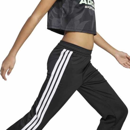Детски долнища на анцуг Adidas House Of Tiro Colors Of Football High-Waisted Wide-Leg Joggers Juniors Adidas House Of Tiro Colors Of Football High-Waisted Wide-Leg Joggers Juniors Детски долнища на анцуг