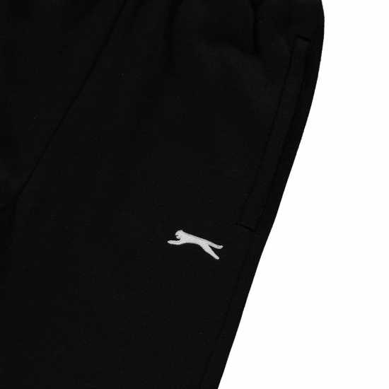Детски долнища на анцуг Slazenger Hem Fleece Pants Junior Черно Slazenger Hem Fleece Pants Junior Черно Детски долнища на анцуг